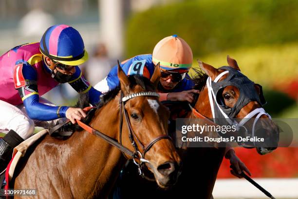 War Like Goddess, ridden by Julien Leparoux beats out Always Shopping, ridden by Irad Ortiz Jr. Down the home stretch to win the 56th running of the...