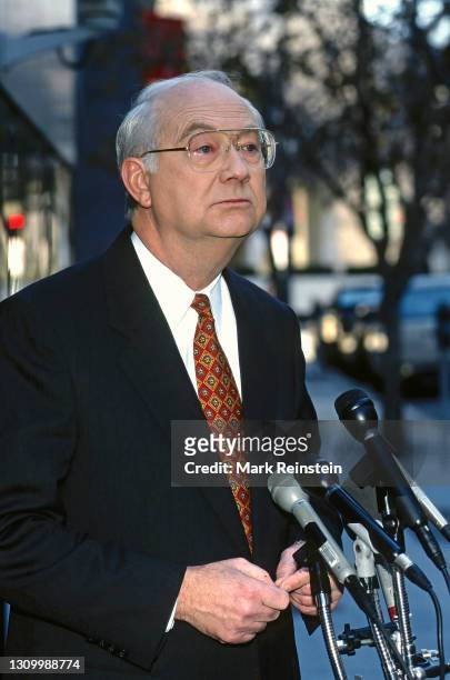 Presidential hopeful Senator Phil Gramm of Texas talks to reporters after his appearance on the ABC Sunday morning talk show "This Week With David...