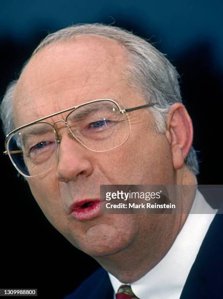 Senator Phil Gramm from Texas talks with reporters outside the ABC studios after his appearance on the Sunday morning talk show "This Week with David...