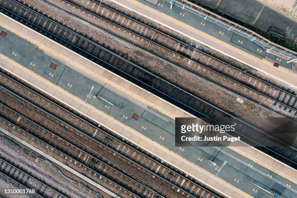 drone view of a railway platform - railroad track stock pictures, royalty-free photos & images