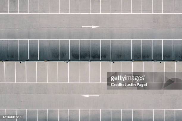 drone view of an empty car park - asphalt von oben stock-fotos und bilder