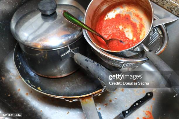 messy kitchen with dirty dishes - untidy sink stock pictures, royalty-free photos & images