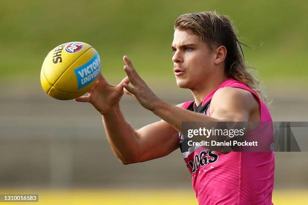 Bailey Smith of the Bulldogs in action during a Western Bulldogs AFL training session at Whitten Oval on March 31, 2021 in Melbourne, Australia.