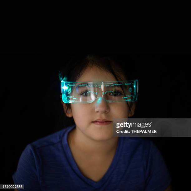 girl with modern glasses with a futuristic look - vinyl film stock pictures, royalty-free photos & images