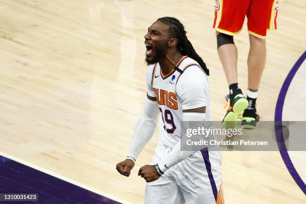 Jae Crowder of the Phoenix Suns celebrates after hitting a three-point shot against the Atlanta Hawks during the second half of the NBA game at...