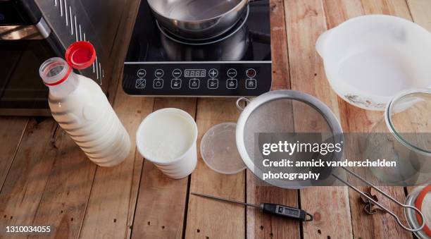 homemade yogurt preparation - yoghurt lid stock pictures, royalty-free photos & images
