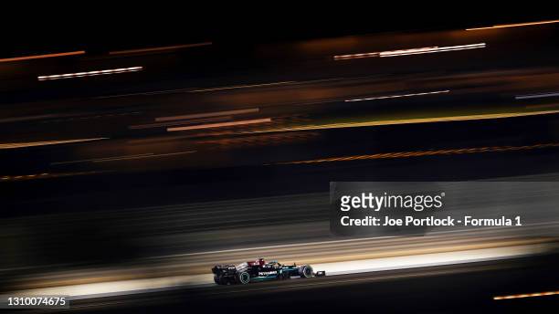 Lewis Hamilton of Great Britain driving the Mercedes AMG Petronas F1 Team Mercedes W12 during the F1 Grand Prix of Bahrain at Bahrain International...