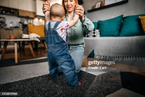 Child First Steps Photos and Premium High Res Pictures - Getty Images