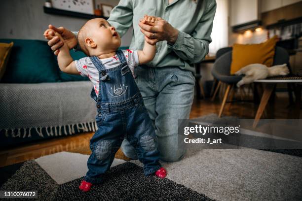 Baby First Step Home Photos and Premium High Res Pictures - Getty Images