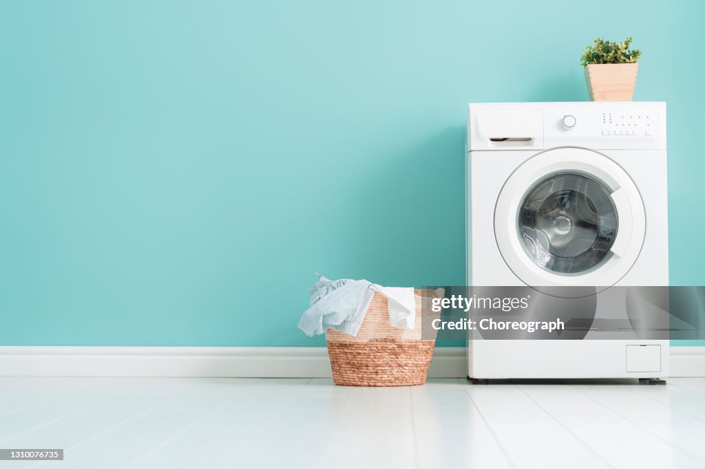 Laundry room with a washing machine