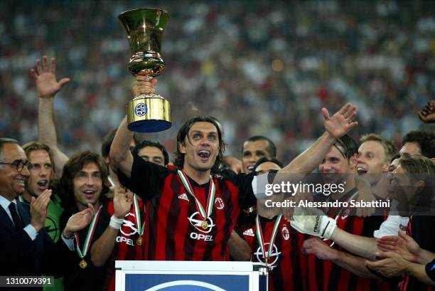 Paolo Maldini of AC Milan celebrates the victory with the trophy after the Finale Coppa Italia match between As Roma and AC Milan at Stadio Olimpico...