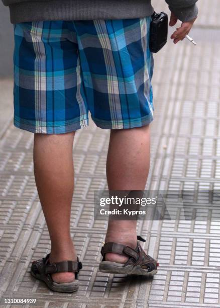 american man with thrombosis walking whilst on vacation - ibiza, spain - blodpropp bildbanksfoton och bilder