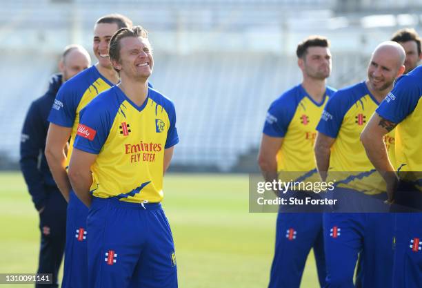 Durham captain Scott Borthwick shares a joke with team mate Chris Rushworth whilst lining up for a socially distanced team picture in the T20 kit...