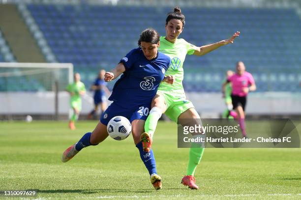 Sam Kerr of Chelsea is fouled by Sara Doorsoun-Khajeh of VfL Wolfsburg leading to Chelsea being awarded a penalty during the Second Leg of the UEFA...