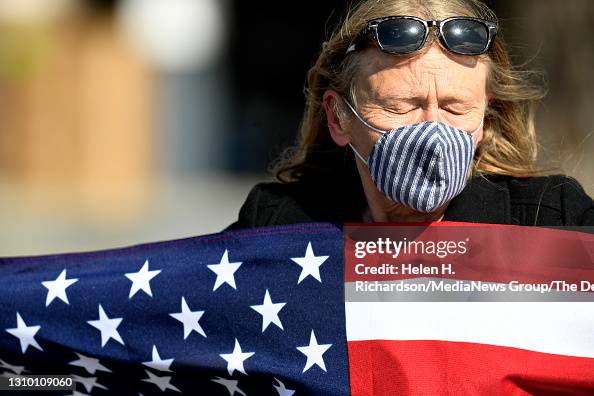 Kelly Rocbatch Kelly Robach holds an American flag as she lines up for the huge ...