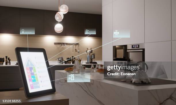 smart home control in kitchen - smart house stock pictures, royalty-free photos & images