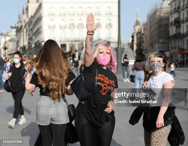 Far-right protester gestures while interrupting a rally on International Transgender Day of Visibility on March 31, 2021 at Plaza del Sol in Madrid,...