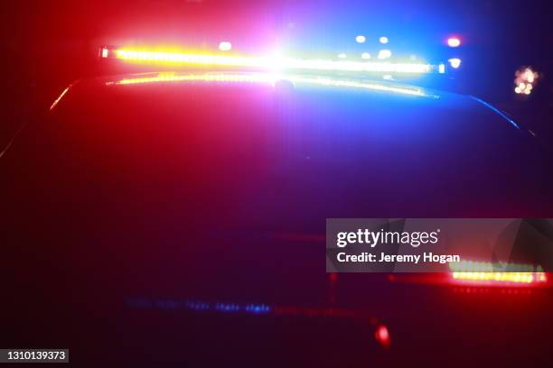 police car with led lights at a crime scene - police lights fotografías e imágenes de stock