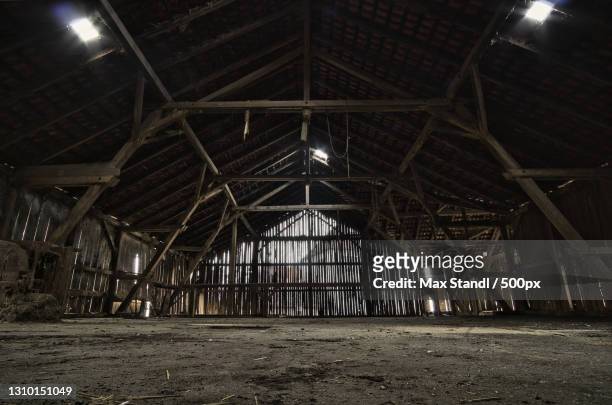 view of abandoned building at night,freilassing,germany - barn stock-fotos und bilder