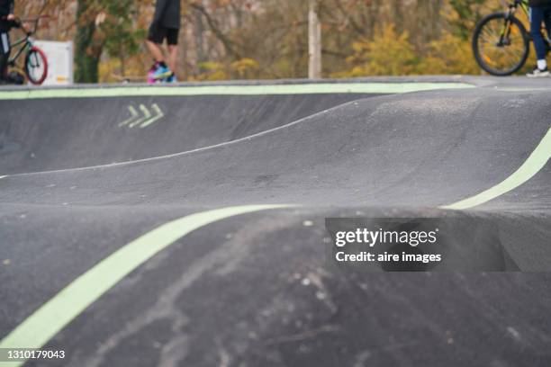 view of an asphalt pumptrack in a park. - bumpy bildbanksfoton och bilder