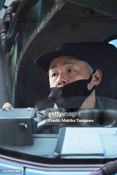 driver of the garbage truck - garbage truck driving stock pictures, royalty-free photos & images