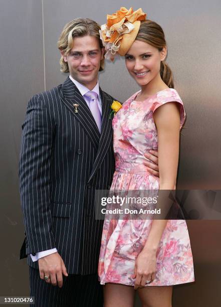 Michael Miziner and Rachael Finch pose outside the Emirates marquee during Melbourne Cup Day at Flemington Racecourse on November 1, 2011 in...