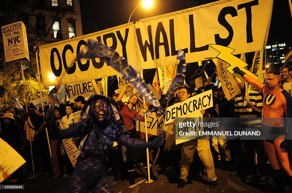 Occupy Wall Street members take part in