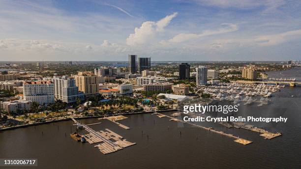 aerial view of downtown west palm beach, florida inlet waterfront during spring break in march of 2021 - west palm beach coast stock pictures, royalty-free photos & images