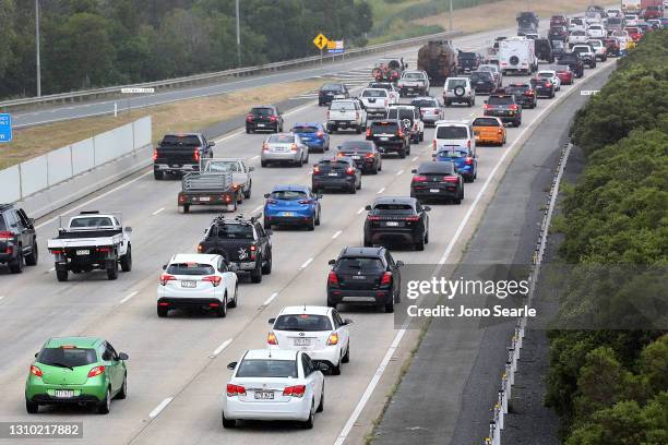 Heavy traffic heads south at Yatala, ahead of the Easter long weekend and after the three-day COVID lockdown, on April 01, 2021 in Brisbane,...