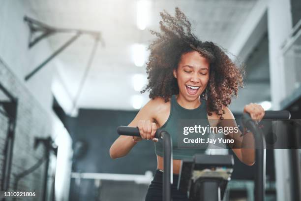 you will burn and firm at the same time - gym interior stock pictures, royalty-free photos & images