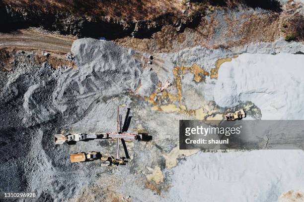 aerial view of gravel quarry - aerial surveillance stock pictures, royalty-free photos & images