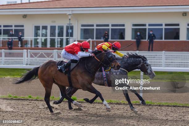 Dylan Hogan riding Engrave win The tote Placepot Your First Bet Handicap at Chelmsford City Racecourse on April 01, 2021 in Chelmsford, England....