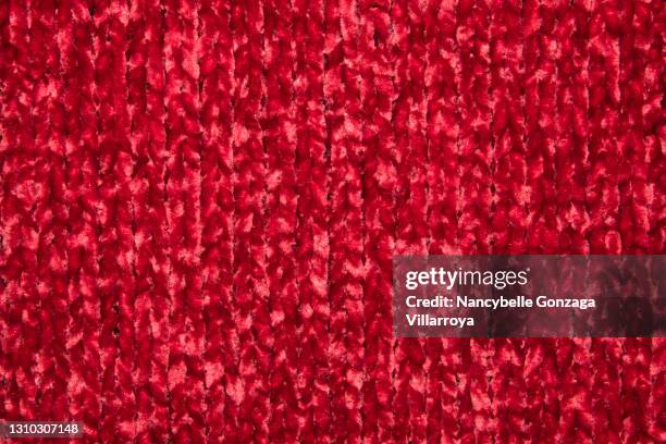 close up image of a red chenille fabric - acrylic fiber stock pictures, royalty-free photos & images