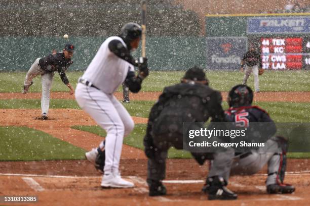 Shane Bieber of the Cleveland Indians throws a first inning pitch to Miguel Cabrera of the Detroit Tigers during Opening Day at Comerica Park on...