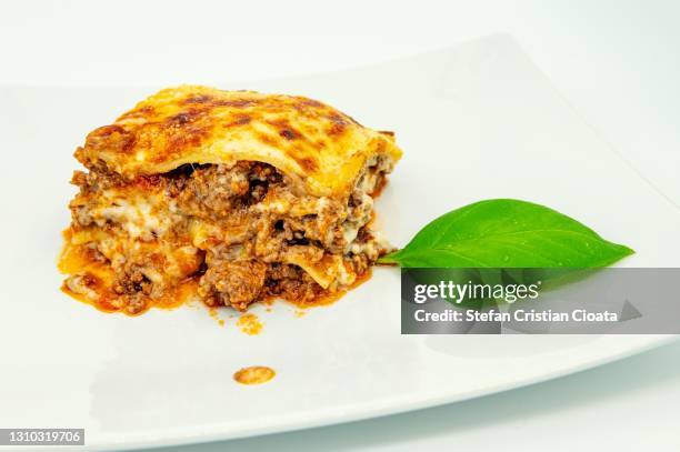 lasagna a la bolognese - serving lasagna stock pictures, royalty-free photos & images