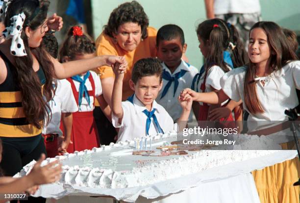 Elian Gonzalez, center, celebrates his seventh birthday at the Marcelo Saldo school in Cardenas,100 miles east of Havana, Cuba.