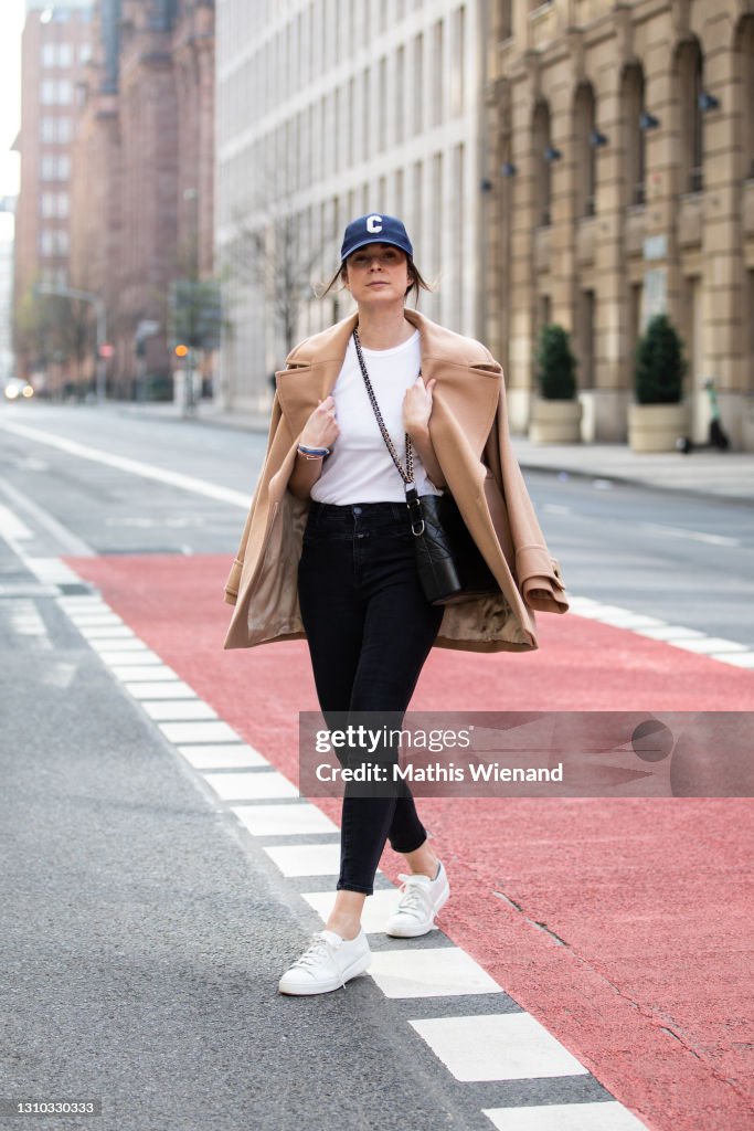 Fashion blogger Patricia Wirschke is seen wearing Ivy and Oak Caban