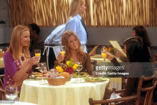 Lisa Kudrow , Jennifer Aniston and Courteney Cox act in a scene from "Friends" .