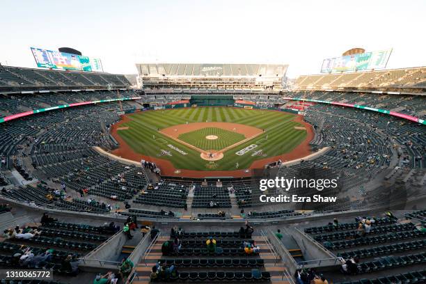 General view of Chris Bassitt of the Oakland Athletics pitches the first pitch of the game against the Houston Astros in their Opening Day game at...