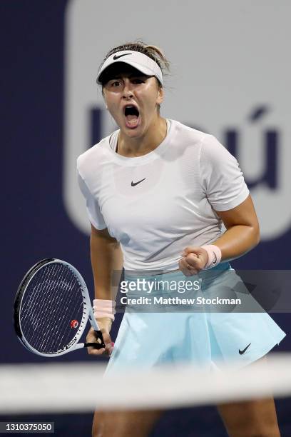 Bianca Andreescu of Canada celebrates winning the first set against Maria Sakari of Greece in the semifinals during the Miami Open at Hard Rock...