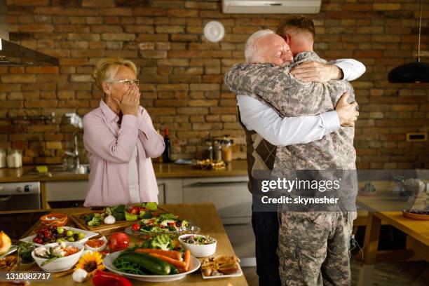 homecoming of a military son! - army soldier family stock pictures, royalty-free photos & images