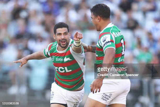 Cody Walker of the Rabbitohs celebrates scoring a try with Latrell Mitchell of the Rabbitohs during the round four NRL match between the Canterbury...