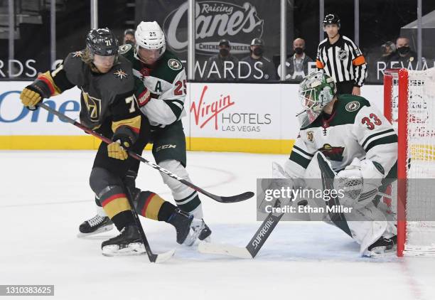 Jonas Brodin and Cam Talbot of the Minnesota Wild defend the net against William Karlsson of the Vegas Golden Knights in overtime of their game at...