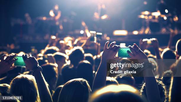large group of people at a concert party. - crowd closeup stock pictures, royalty-free photos & images