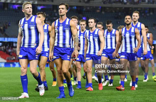 Jack Ziebell and his Kangaroos team mates look dejected after losing the round 3 AFL match between the North Melbourne Kangaroos and the Western...