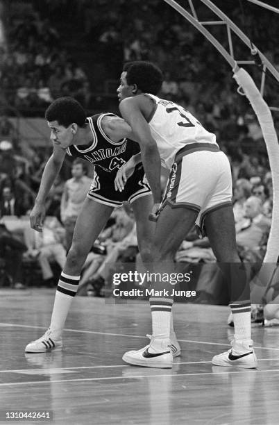 January 23, 1976: George Gervin of the San Antonio Spurs blocks out David Thompson during an ABA game against the Denver Nuggets at McNichols Arena...