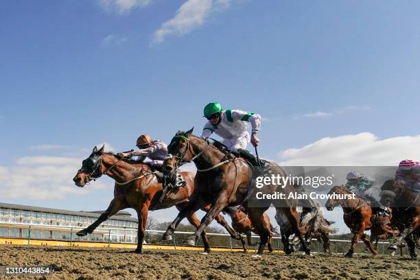 Adam Kirby riding Summerghand win The Betway All-Weather Sprint Championships Conditions Stakes at Lingfield Park Racecourse on April 02, 2021 in...