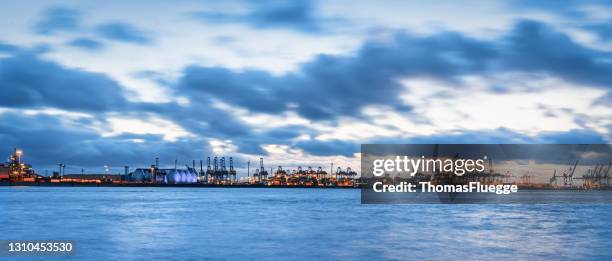 blue hour in the port of hamburg - herstellendes gewerbe stock pictures, royalty-free photos & images