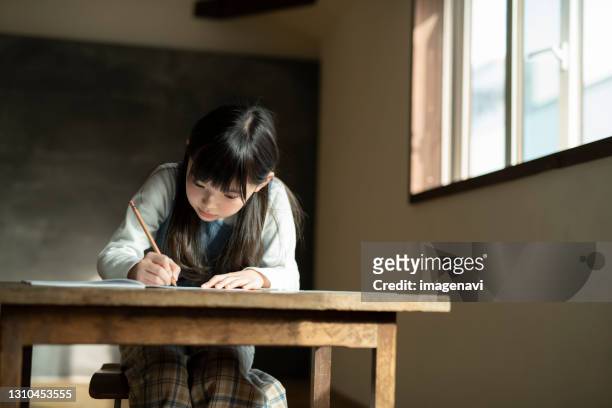 girl transcribing - japanese people lesson english stock pictures, royalty-free photos & images