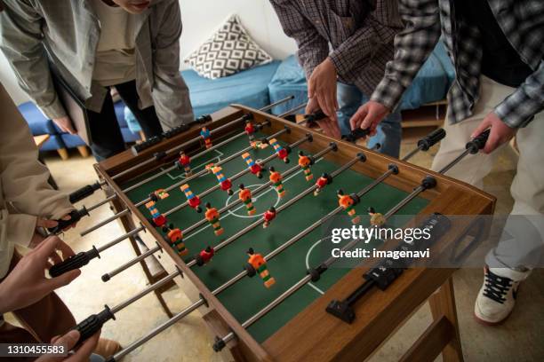 young people enjoying table football - 18 23 months stock pictures, royalty-free photos & images